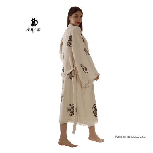 Aztec bathrobe in long lightweight plush fleece with hood, full length sleeves, tribal print, and pockets for women’s cozy loungewear and winter spa robe
