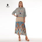 Female model wearing boho blue dress with airy batwing sleeves