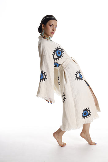 Handmade cotton kimono robe styled as a relaxed beach and coastal resort layer.